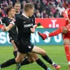 Olise, do Bayern de Munique, foi protagonista contra o Freiburg (foto: Alexander Hassenstein/Getty Images)